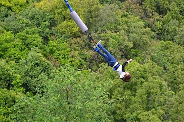 a girl doing bungee jumping