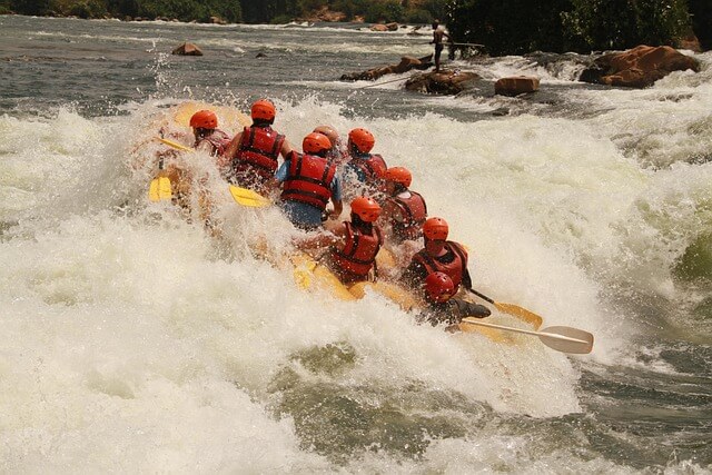 a group of people river rafting