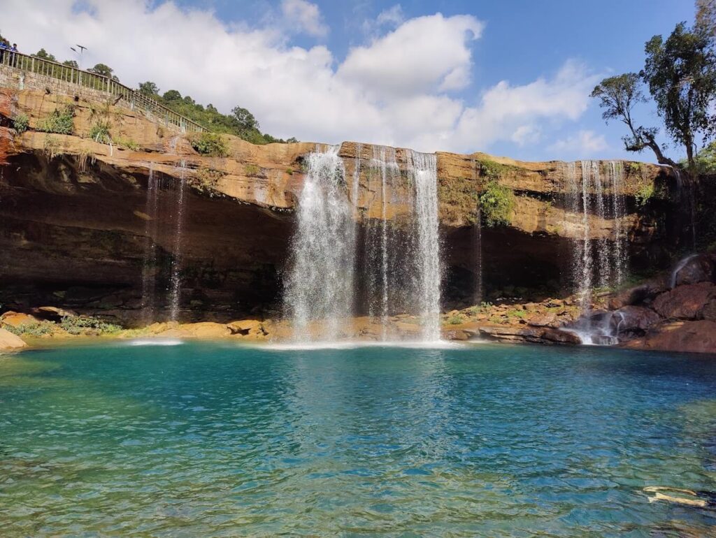 Krang Suri waterfall with blue water in Meghalaya