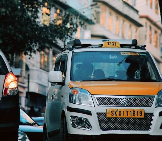 Local taxi traveling through roads in Sikkim