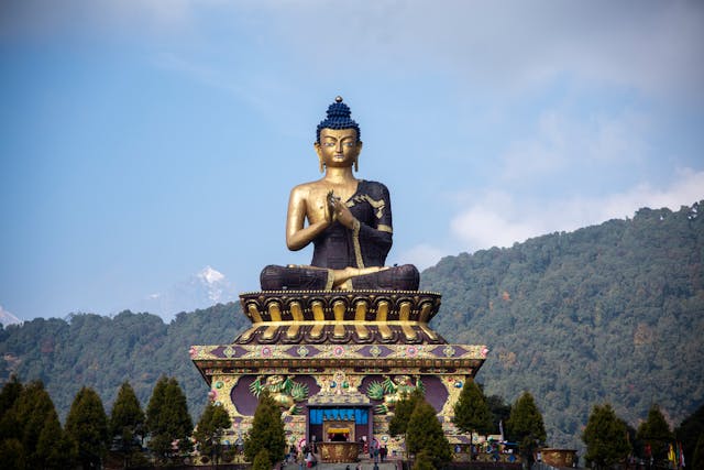 Giant Buddha statue in Ravangla with mountain backdrop